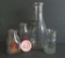 Four Pyro colored advertising milk bottles, 1/2 pint and quart