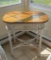 Wicker side table with oak top