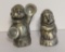 Two heavy paperweight pewter Peltro monks, one singing and one playing cymbals