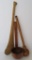 Three large wooden primitive utensils, masher, scoop and paddle
