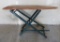 Wooden ironing board with painted legs, 52 1/2