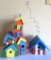 Two whimsical colorful bird houses, 7 1/2