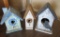 Three wooden birdhouses, 9