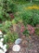 Garden art, metal flower rain gauge, metal bunny and two garden stones (resin)