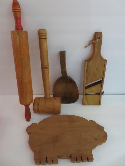Wooden utensils, rolling pin, mallet, butter paddle , and pig cutting board