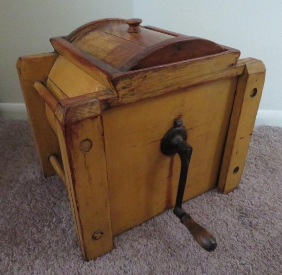 Mustard colored wooden barrel style butter churn, counter top style