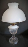 Unusual oil lamp with enamel shade, 17