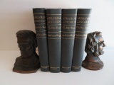 Two unmatched metal Lincoln bookends with four Carl Sandburg The War Years Abraham Lincoln books