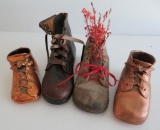 Four single baby shoes, two bronzed and two leather