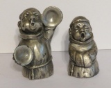 Two heavy paperweight pewter Peltro monks, one singing and one playing cymbals