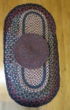 Four braided rugs and runners
