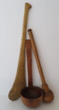 Three large wooden primitive utensils, masher, scoop and paddle