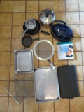 Kitchen lot with kettles, turkey roaster, griddle pan, and cooling racks