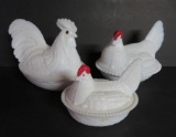 Three milk glass chicken on nest covered dishes