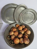 Three pewter chargers , tray, and tin bowl