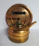 Copper charger and copper and brass plated tea kettle