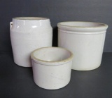 Three stoneware crocks and jar
