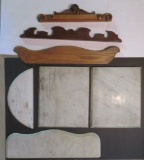 Four marble pieces and three wooden splash backs