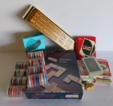 Assorted game lot, cards, cribbage board, dominos, poker chips and dice