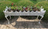 Metal planter with metal insert and geraniums