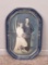 Ornate picture frame with wedding photo, 21
