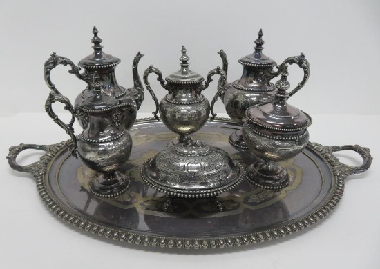 Ornate silverplate tea service, seven pieces, monogrammed P, tray does not match other pieces