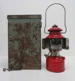 Early Coleman lantern in metal box, red, model 200A