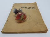 Pin Up steering wheel knob and Popular Science Fact Book on 1954 Cars
