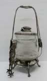 Antique pickle castor, with ornate pickle finial and swan legs, tongs