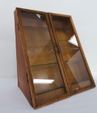 Curtis Candy Co display case, glass front, slant, two door