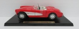 1957 Red Corvette die cast model on stand, convertible, 9