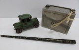 Three vintage toys, cast iron car, still bank and Calura