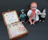Four bisque dolls