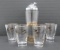 MCM retro cocktail set, shaker and four atomic decorated glasses