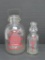 Two pyro milk bottles, gallon and quart