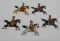 Five metal Cracker Jack toy prizes, jockey, 2 1/4