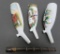 Three porcelain decorated pipe bowls and one pipe stem (unmatched), 4 1/2