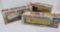 Two Lionel boxed train cars and remote control switch