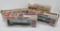 Four Lionel 027 gauge cars and switch with boxes