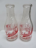 Two red pyro quart milk bottles, Schuchardt Dairy Sheboygan, Little Jack Horner