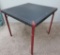 Coca Cola card table, embossed top with coca cola bottles in corners, 29