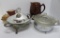 Covered serving dishes, earthenware pitchers and sugar bowl
