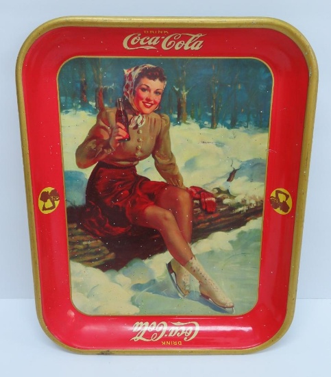 Drink Coca-Cola tray, Ice skating woman sitting on log, c 1941