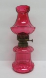 Small Cranberry oil lamp, 8 1/2