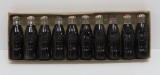 Ten Mini Coca-Cola lighters in box, 2 1/2