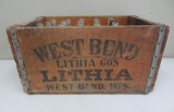 West Bend Lithia wood beer box and 21 bottles, several with neat labels