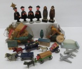 Large group of toys attributed to Erzgebirge, wooden building, people, vehicles and choir