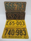 Four vintage license plates, Wisconsin, 1935-1936-1941-1953