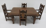 Wooden doll furniture, table and four carved back chairs