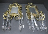 Pair of brass beveled mirror wall sconces with large prisms, 19